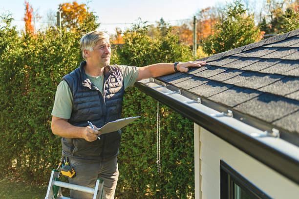 Professional Hail Damage Roof Repair technician working in Mc Lean, NY